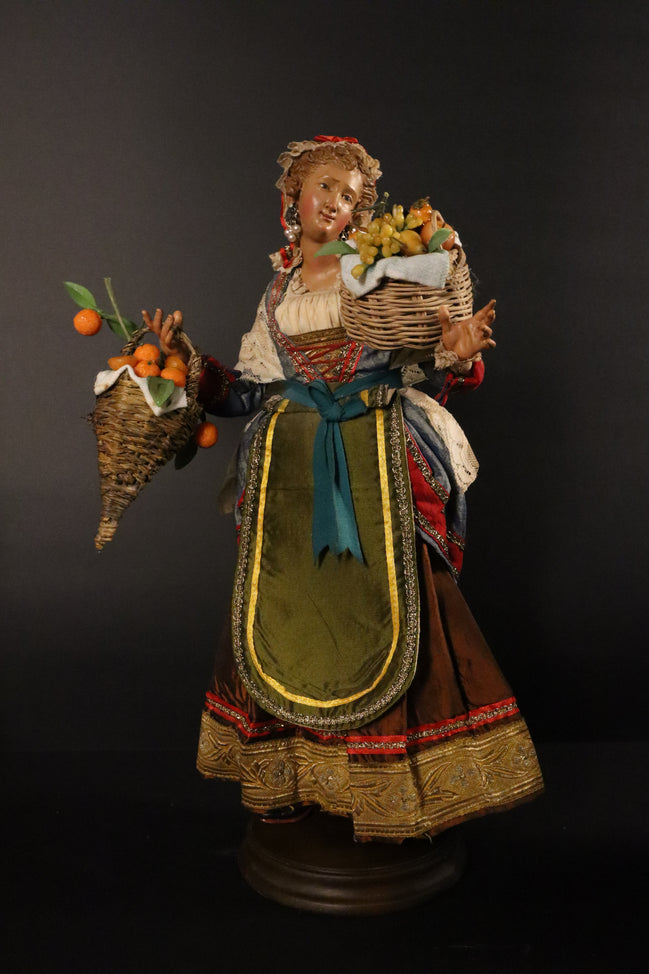 Giovane venditrice di frutta