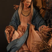 Natività 33cm con base in legno oro e cestino