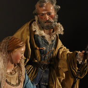 Natività 33cm con base in legno oro e cestino